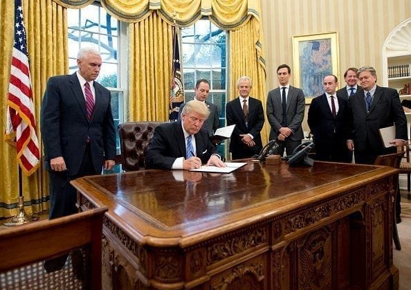 Trump signs executive orders in the Oval Office