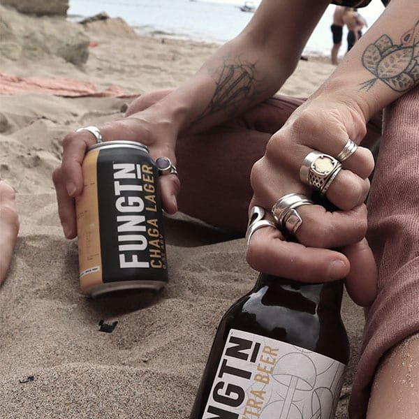 Fungtn Can And Bottle On Beach Lifestyle