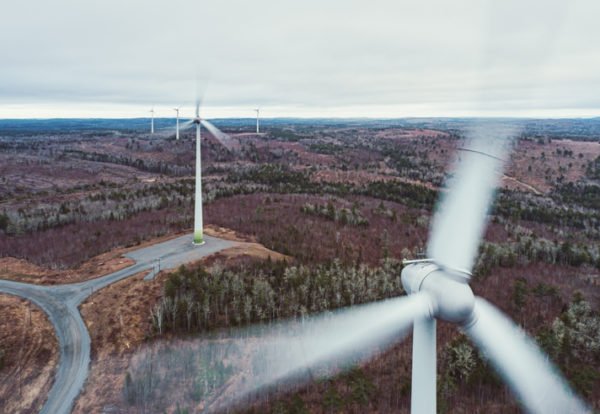 Aerial drone view of wind turbines