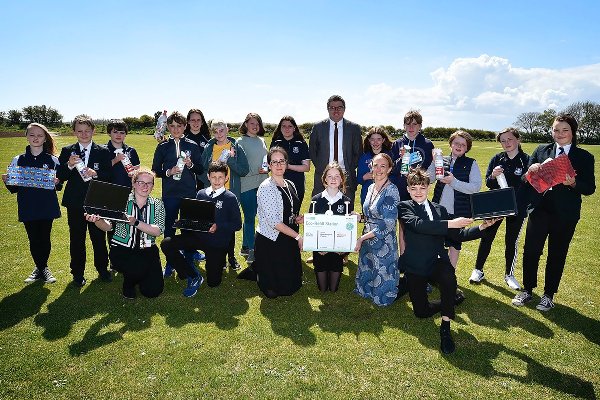 Children at Eksdale School launching the Eco-Refill station Eco Enterprise