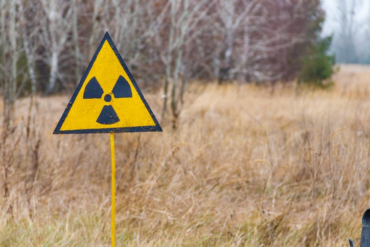 Radiation warning sign in Chernobyl Exclusion Zone in Ukraine