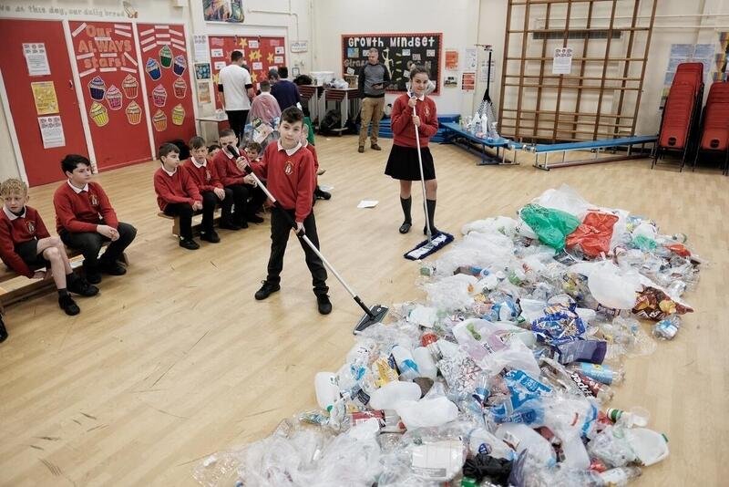 Schoolchildren at St Wulstan's Roman Catholic Primary School have brought their plastic waste to school and are counting the plastic packaging waste.