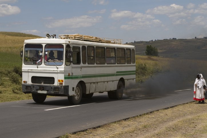 Smoking fumes from a bus in Ethiopia, along the road from Addis Ababa to Debre Lebanos