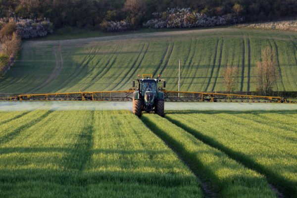 Farmer spraying crops in Malton, North Yorkshire