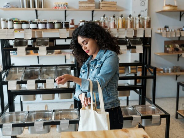 Young woman shopping for natural products in an eco store