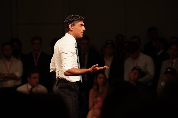 Prime Minister Rishi Sunak answering questions from members at Conservative Party Conference 2023