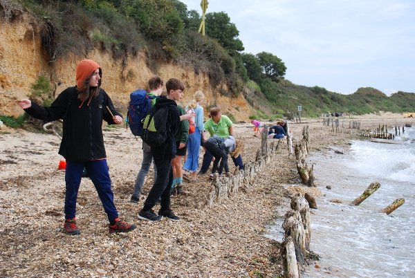 Young people at Lepe beach on a Junior Rangers session with the New Forest NPA