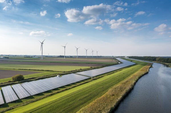 Solar panels and wind turbines generating renewable energy for a green and sustainable future