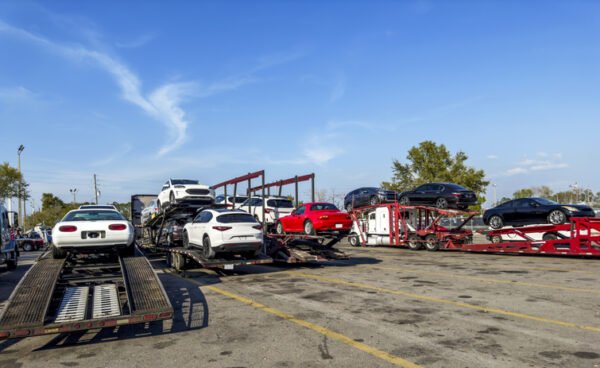 Car transportation truck and used cars