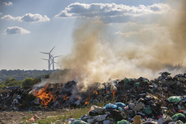 Wild rubbish dump on fire