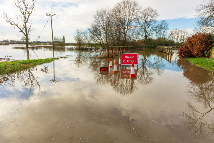 Severe flooding on the B1223 road between the rural villages of Ryther and Cawood near Selby in North Yorkshire with water from the River Wharfe spilling over into agricultural fields