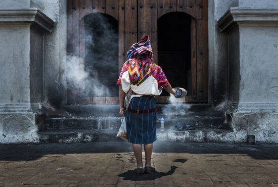Mayan woman performing a ritual in Chichicastenango, Guatemala
